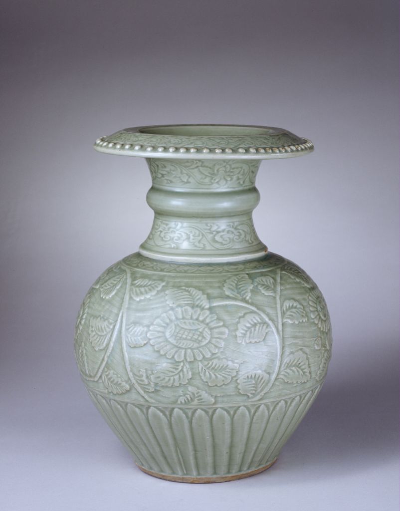 图片[1]-Longquan kiln green glaze carved pomegranate style statue-China Archive